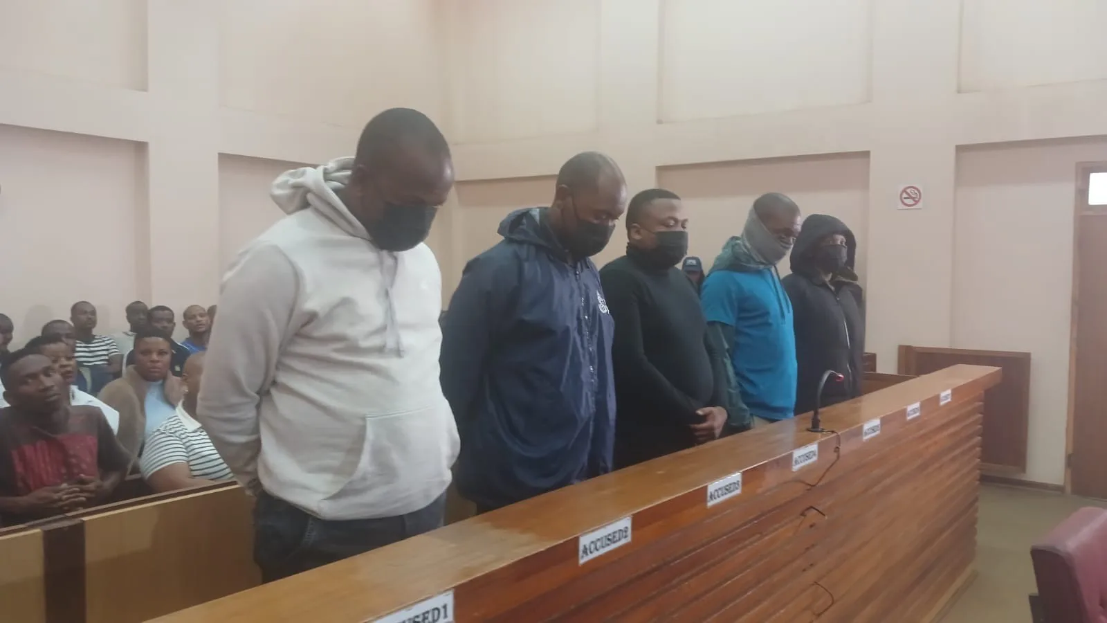 Alleged Robbers Remain in Custody